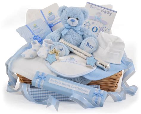 A beautiful newborn baby boy gift basket with cotton baby wear and a cute plush elephant toy. newborn baby gift baskets | Baby Shower Idea's | Pinterest ...