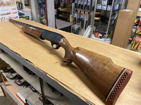 Remington Model 1100 Trap Semi Auto Shotgun Deluxe Wood Stock Engraved