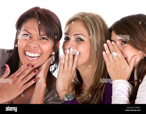 Group Of Girls Gossiping Isolated Over A White Background Stock Photo