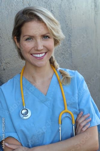 Portrait Of A Sexy Young Female Doctor With Stethoscope On Her