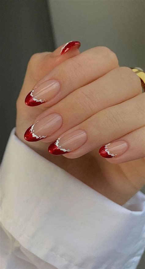 40 festive christmas and holiday nails 2021 red french tip holiday nails