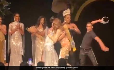 video enraged husband breaks beauty pageant winner s crown in brazil as wife places second