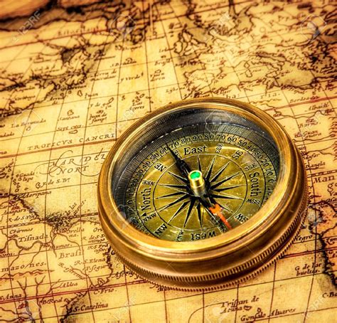 Vintage Still Life Vintage Compass Lies On An Ancient World Map