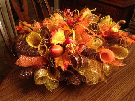 It is very easy to use, simply insert the flowers and stick them in the soil. Fall grave saddle | Flower arrangements diy, Memorial ...
