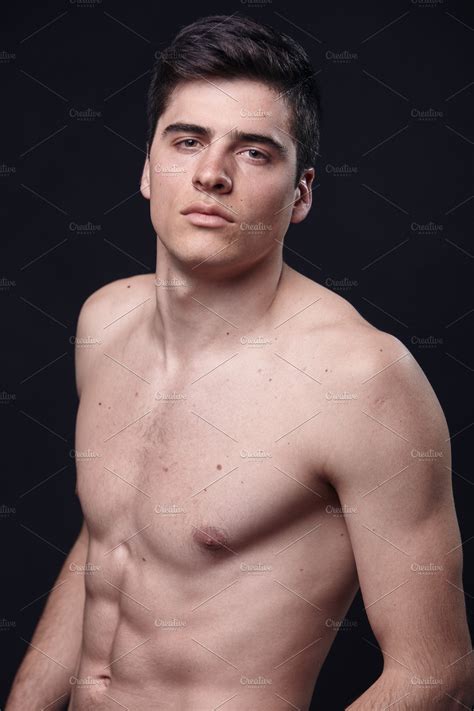 One Young Handsome Man Model Shirtless Simple Studio Upper Body Shot