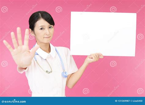 Nurse making stop sign stock image. Image of attention - 131269987