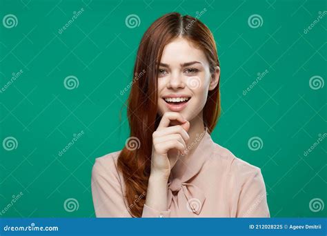 Pretty Cheerful Woman Holds Her Hand On Her Face Attractive Look Green Background Stock Image