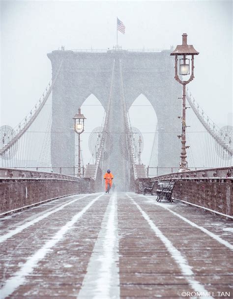 Crossing Brooklyn Bridge Under The Snow By Rommel Tan Rtanphoto