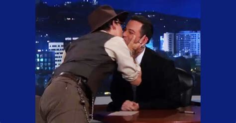 Johnny Depp Plants Three Kisses On Jimmy Kimmel