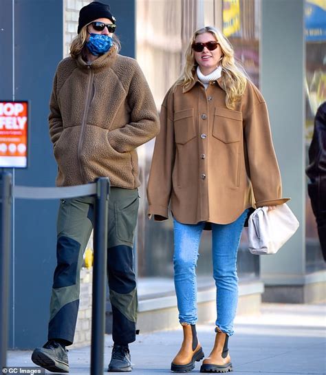 Elsa Hosk Hides Baby Bump In Flowing Jacket As She Steps Out In