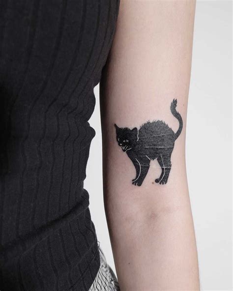 Black Cat Tattoo By Ann Gilberg Inked On The Left Arm Black Cat