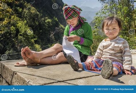 Mother Working And Watching Her Baby At Same Time In Sapa Vietnam