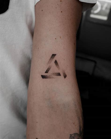 Dotwork Penrose Triangle Tattoo On The Bicep
