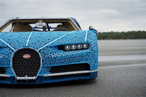The bugatti model car measures over 5 inches (14cm) high, 22 inches (56cm) long and 9 inches (25cm) wide. They Drove This LEGO Technic Bugatti Chiron | DSF.my