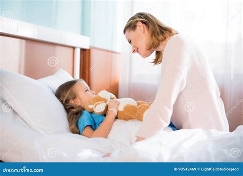 Woman With Daughter In Hospital Stock Image Image Of Clinic People