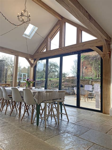 Find out all you need to know about the practicalities of extending a house, including costing, planning and design in our essential guide. Open plan Oak frame extension, Creaton | Bespoak Timber Frames