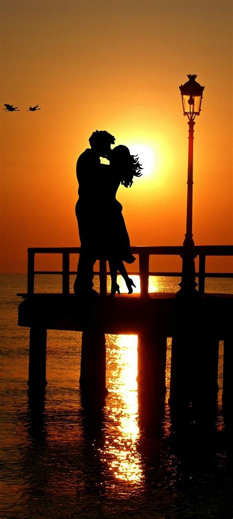 Couple 4k Wallpaper Romantic Kiss Sunset Silhouette Together