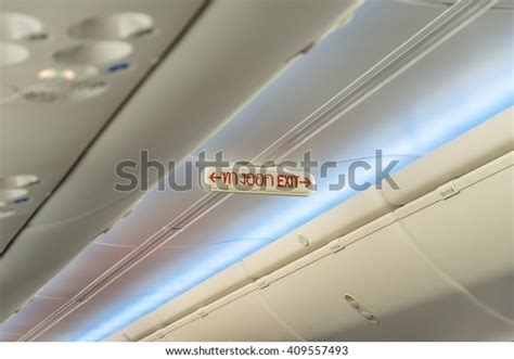 Emergency Exit Row Airplane Exit Sign Stock Photo 409557493 Shutterstock