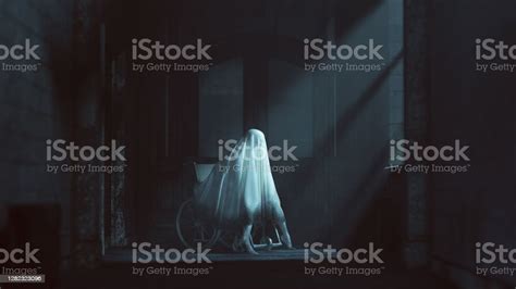 Ghost Evil Spirit Sitting In A Wheelchair In A Derelict Asylum Hospital