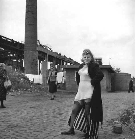 Female Prostitute Standing Near The Partially Destroyed Krupp Factory Essen Germany