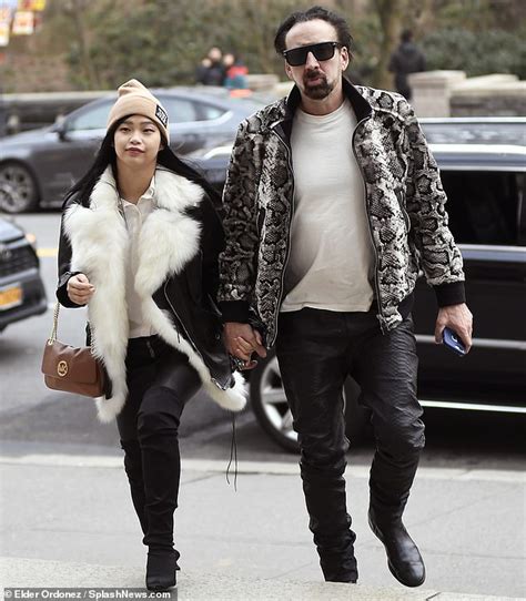 Nicolas cage is an american actor, director, and producer. Nicolas Cage, 56, holds hands with a girlfriend Riko ...