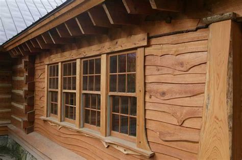 Quarter log cabin siding offers many other advantages over round log besides just price. This looks like a fairytale house | Log cabin siding ...