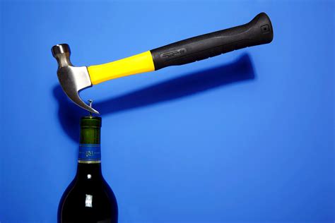 2 using a sommelier knife. 5 Ways To Open A Bottle Of Wine Without A Corkscrew | Just ...