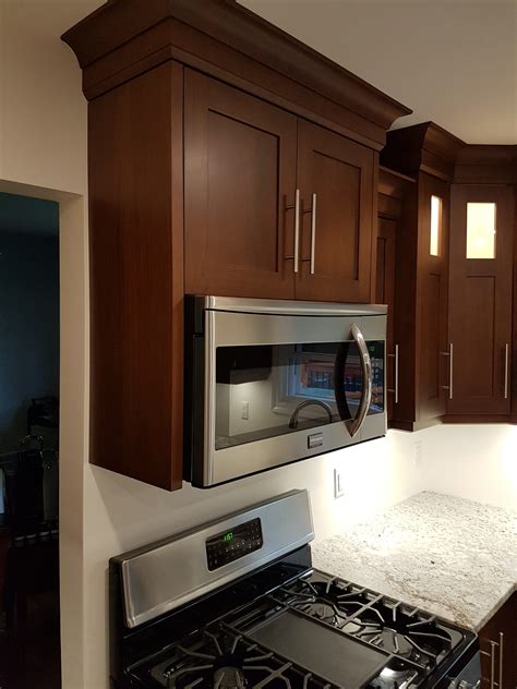 But that practice is on its way out. Over the Range Microwave Cabinet - Nova Woodworks & Custom ...