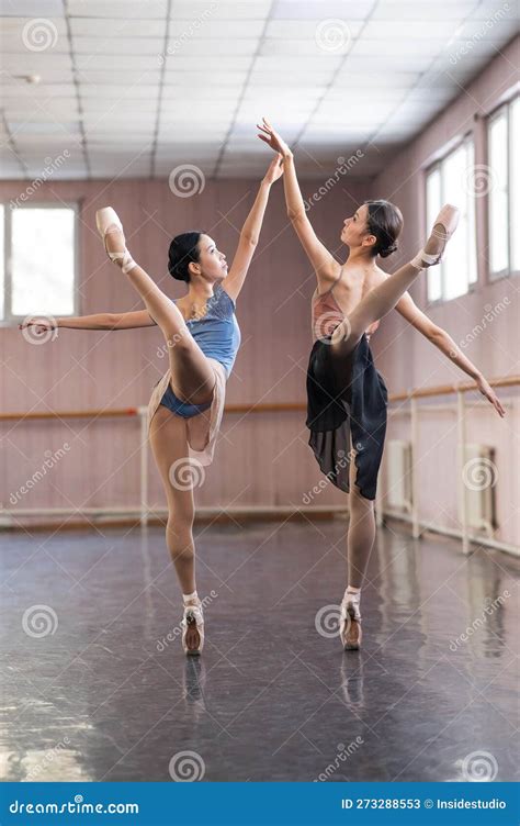 two asian ballerinas are dancing in the class stock image image of foot activity 273288553