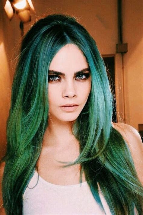 Cara delevingne stars in burberry her intense fragrance campaign burberry continues to reimagine its her perfume with a new scent called, markher intense. model, cara delevingne, green black roots layered long ...