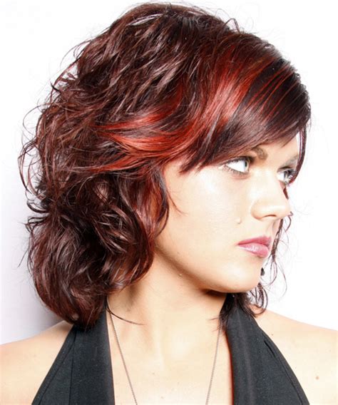 Above all, this marvelous curly hairstyle for medium hair gives you the freedom of choosing the size of curls to form on your head. Medium Wavy Dark Red Hairstyle with Side Swept Bangs