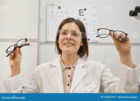 Female Optometrist Holding Glasses Stock Image Image Of Eyewear Prescription 169266799