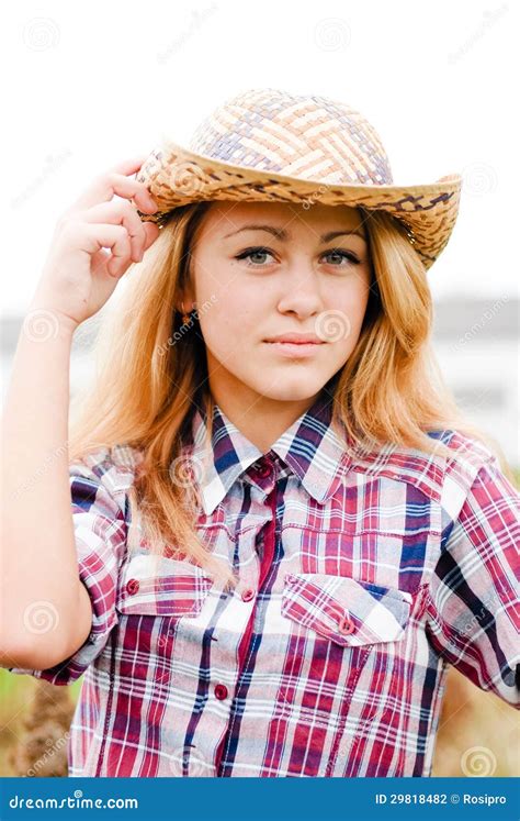 Pretty Smiling Happy Blond Teenage Girl In Cowboy Hat Stock Photo