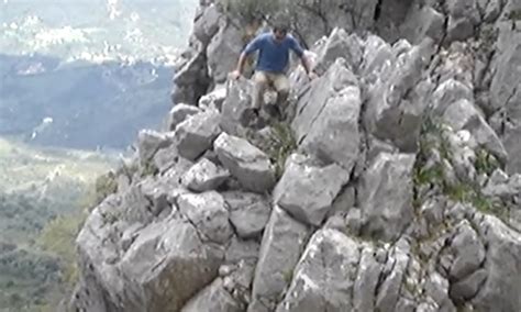 Climbers Release Large Boulder Down Cliff Face