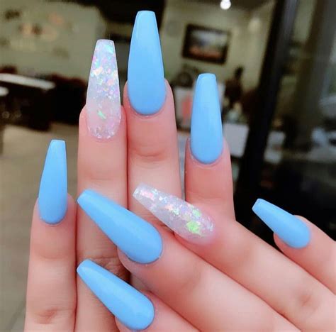 Cute Acrylic Nails White And Blue Wear Gold Rings As Well