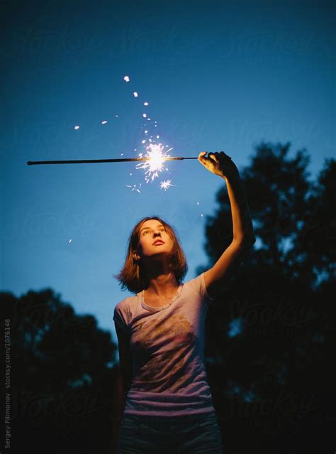 Woman And Burning Sparkler On Nature By Sergey Filimonov Sparkler