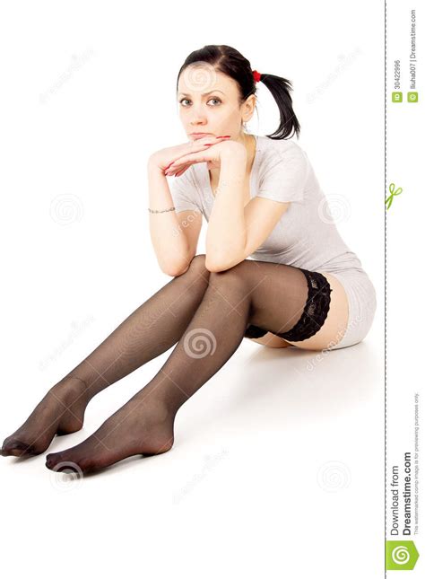 Seksowny Dziewczyny Obsiadanie Na Podłoga W Białych Pończochach Zdjęcie Stock Obraz złożonej z
