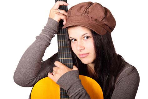 acoustic guitar cute female girl guitar guitarist instrument music people royalty free