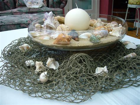 For example, their favorite hobbies, favorite color, or maybe even their favorite destination. something like this | Beach theme centerpieces, Beach ...