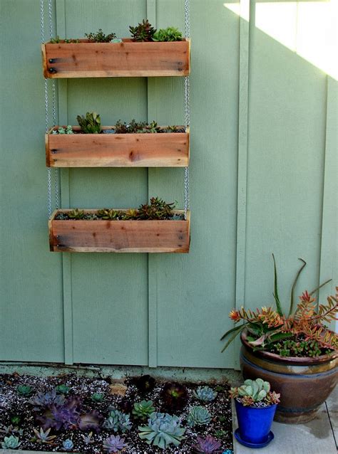 They fit with the green atmosphere and make the garden even more beautiful. 20 DIY Wooden Planter Boxes for Your Yard or Patio