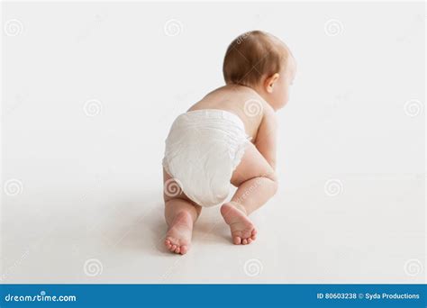 Little Baby In Diaper Crawling On White Floor Stock Photo Image Of
