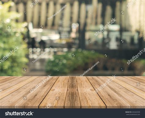 Wooden Board Empty Table Front Blurred Stock Photo