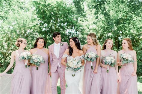 Bridal Party With Bridesmanman Of Honor In Matching Pink Suit Male