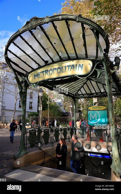 The Art Nouveau Style Entrance Of Abbesses Metro Station With The