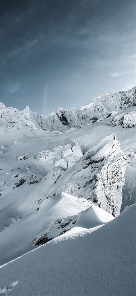 Snow Covered Mountain Under Blue Sky During Daytim Iphone X