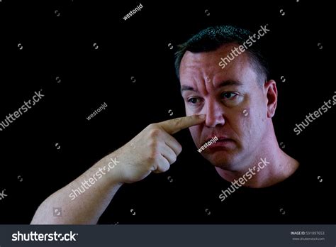 Image Handsome Man Pointing His Nose Stock Photo 591897653 Shutterstock