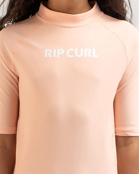 Shop Rip Curl Girls Classic Surf Short Sleeve Rash Vest In Peach