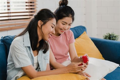 free photo asian lesbian lgbtq women couple propose at home