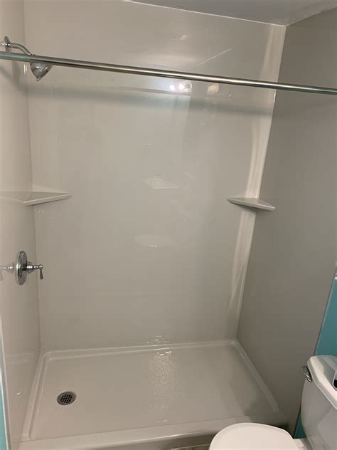 Bathtub And Tile Walls Replaced With An Acrylic Wall System And An