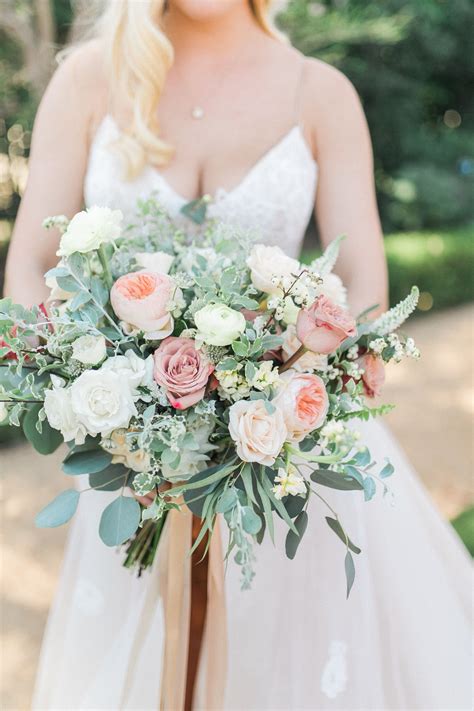 Earthy Bridal Bouquet With Blush And Cream Roses